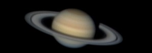 The Planet Saturn with rings fairly open.